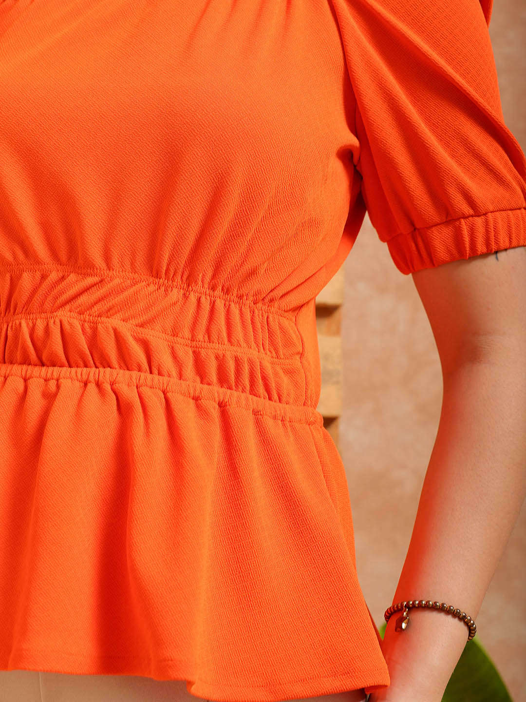 Women's Orange Fit and Flare Textured Peplum Top