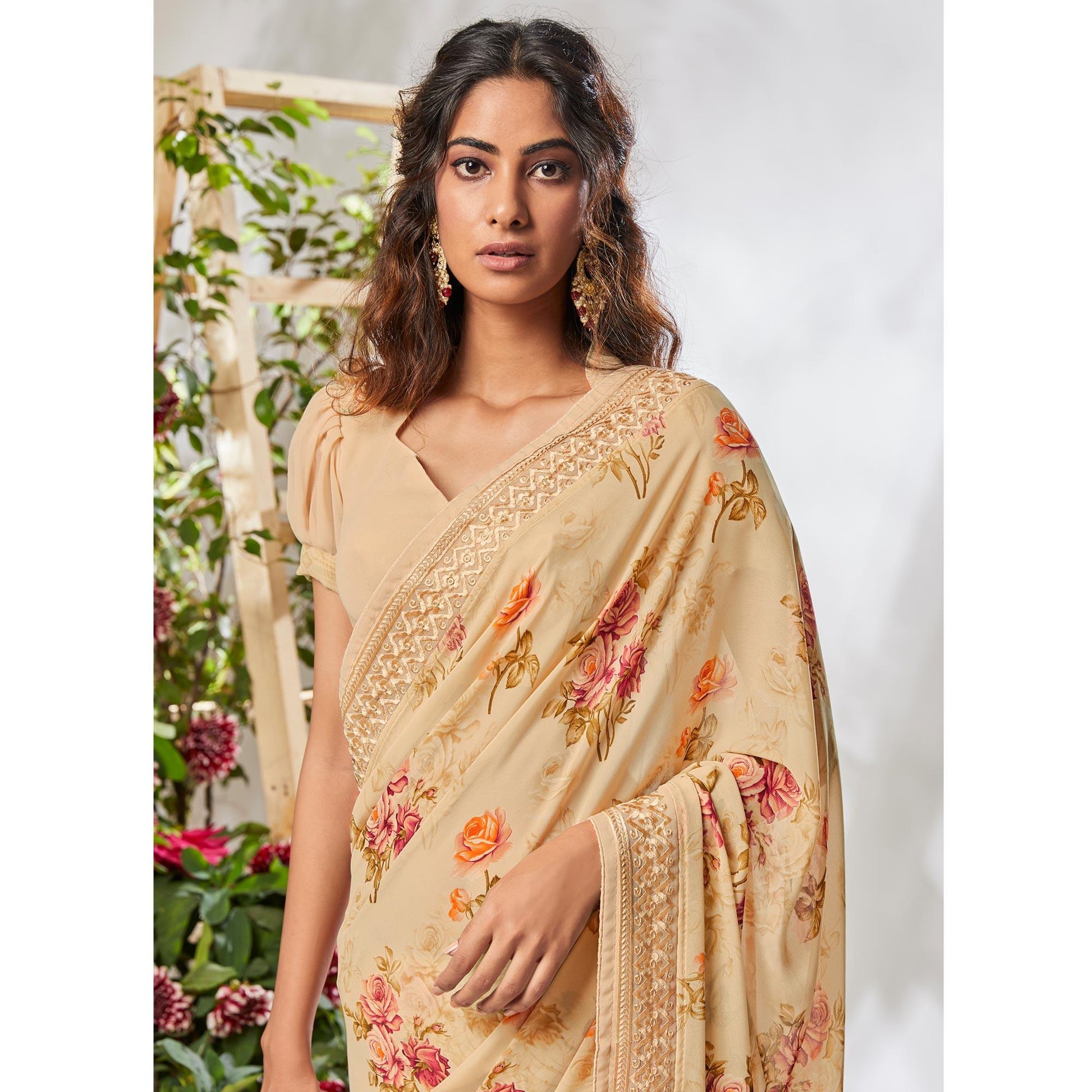 Cream Floral Printed With Embroidered Border Georgette Saree