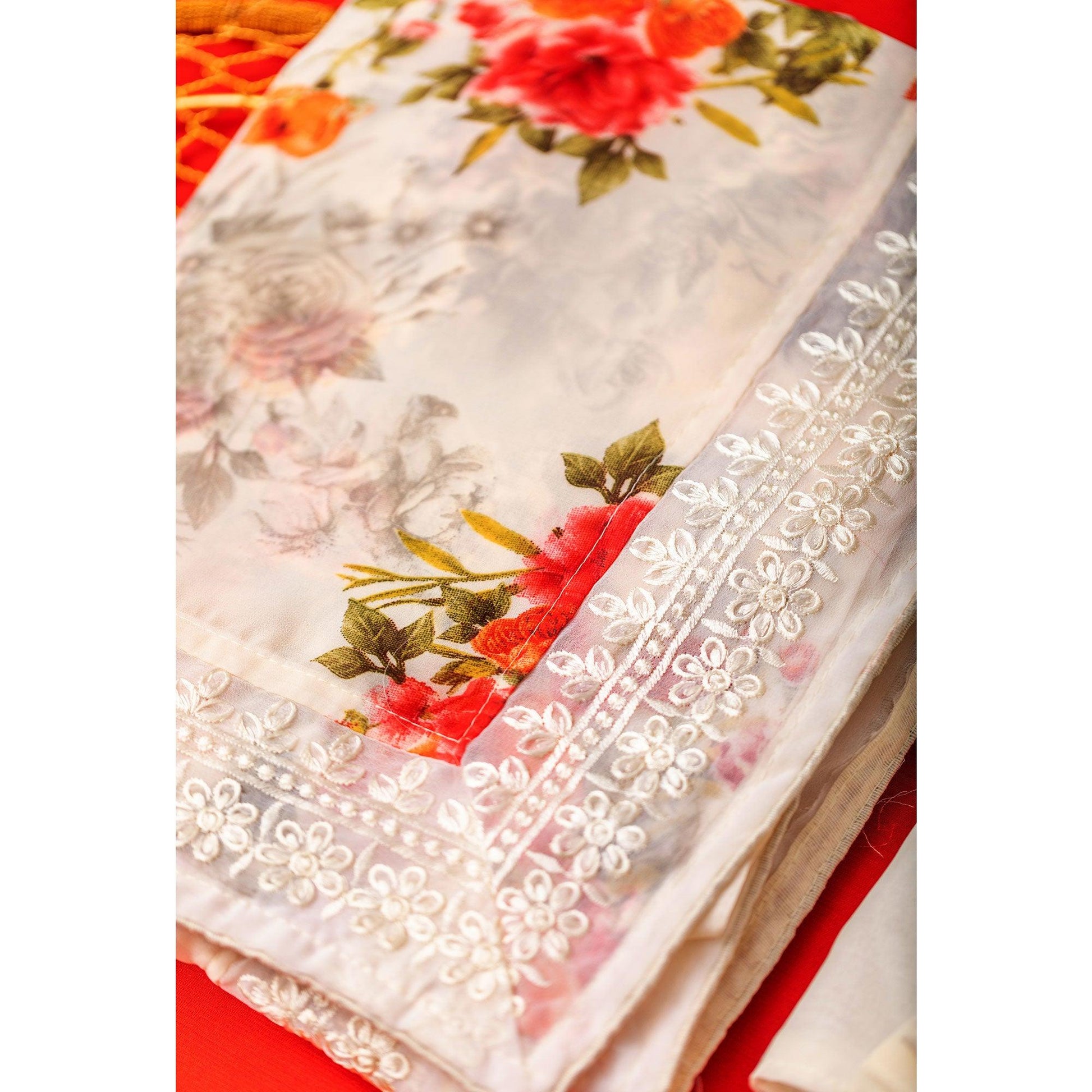 Cream Floral Printed With Embroidered Border Georgette Saree