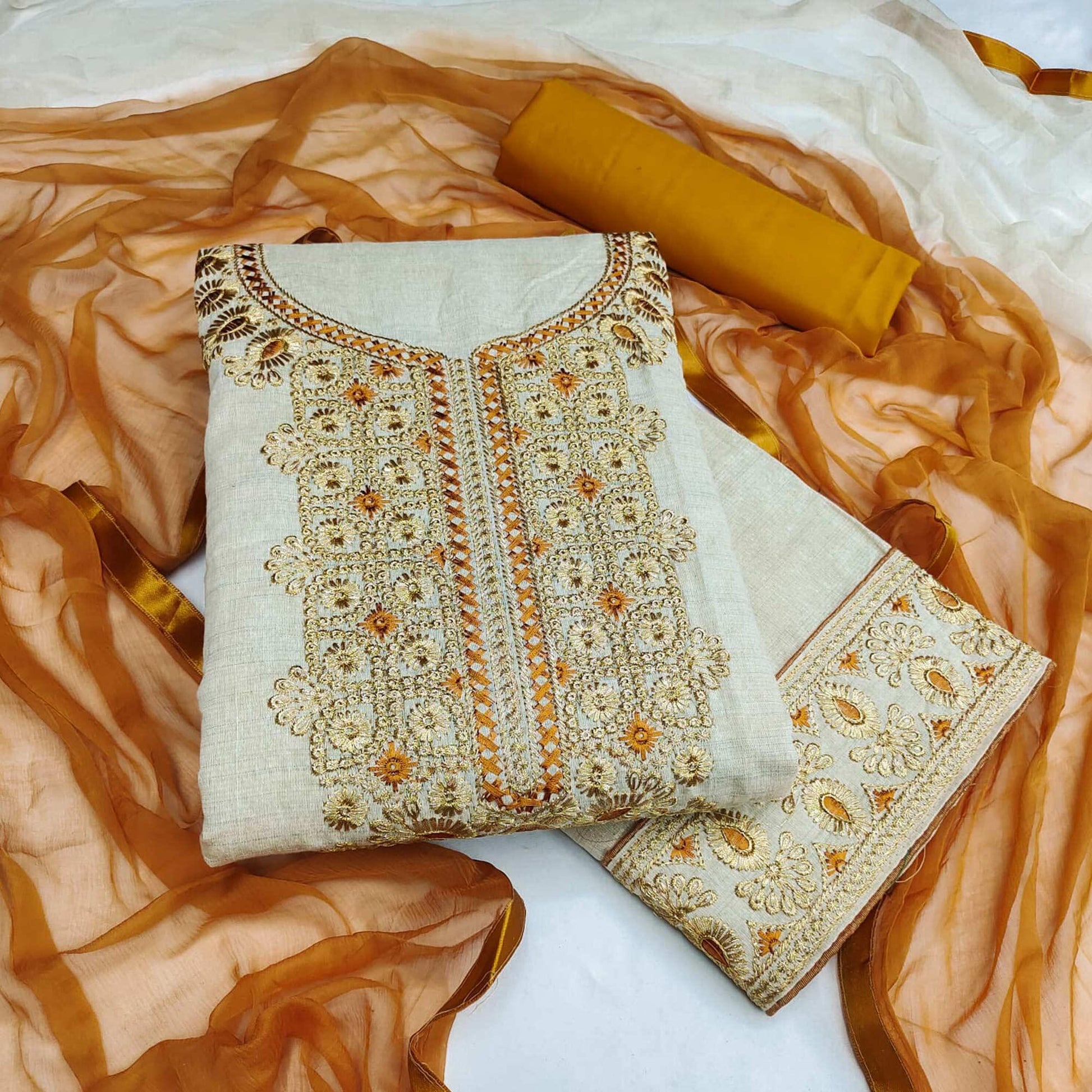 Cream-Gold Festive Wear Embroidery With Mirror Work Cotton Dress Material
