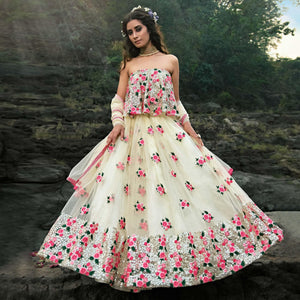 Cream Partywear Sequins Embroidered Soft Net Lehenga Choli