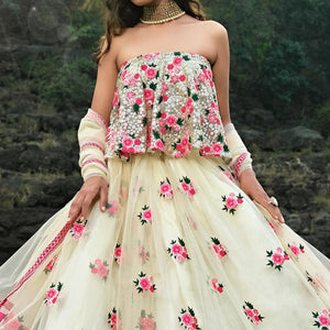 Cream Partywear Sequins Embroidered Soft Net Lehenga Choli