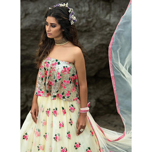 Cream Partywear Sequins Embroidered Soft Net Lehenga Choli