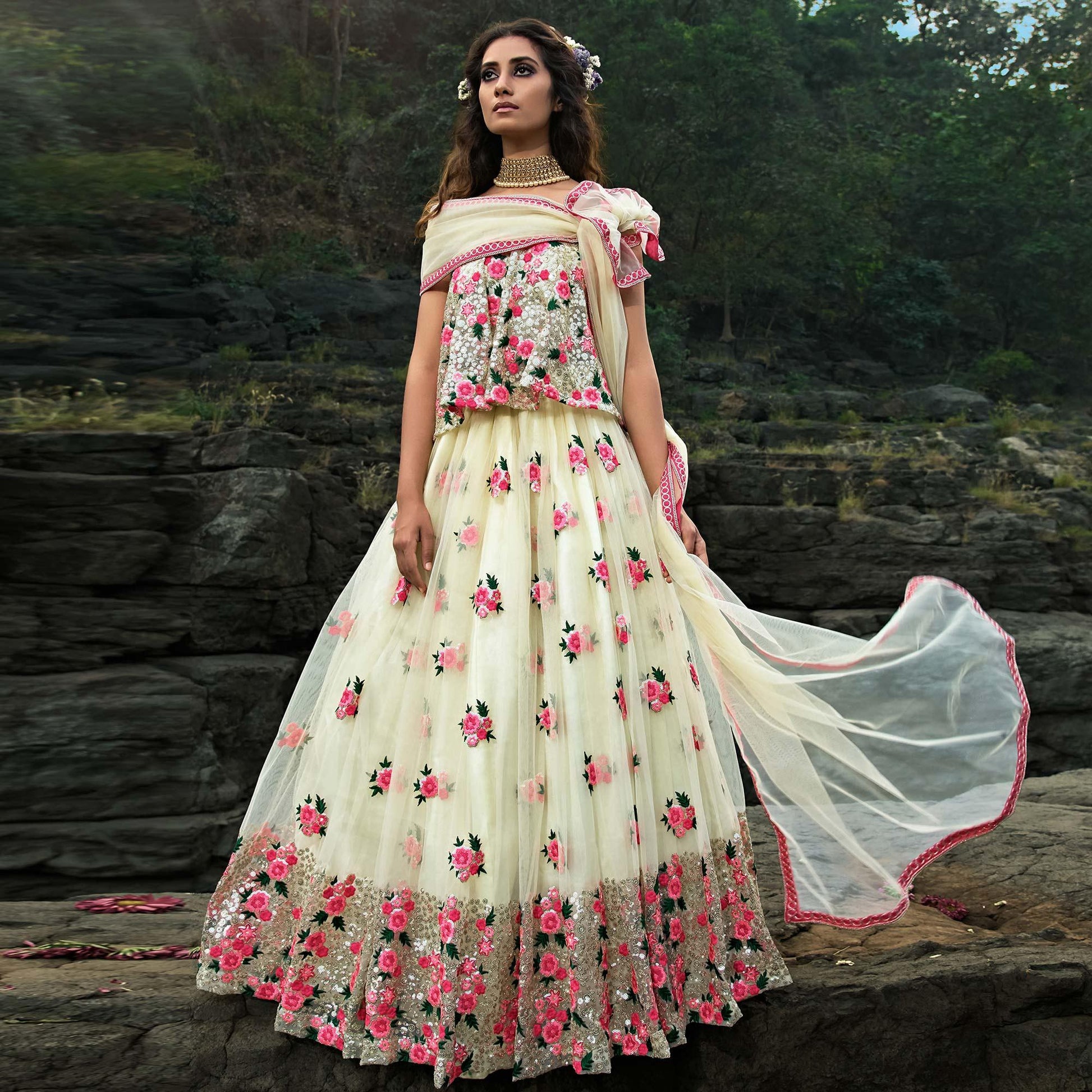 Cream Partywear Sequins Embroidered Soft Net Lehenga Choli