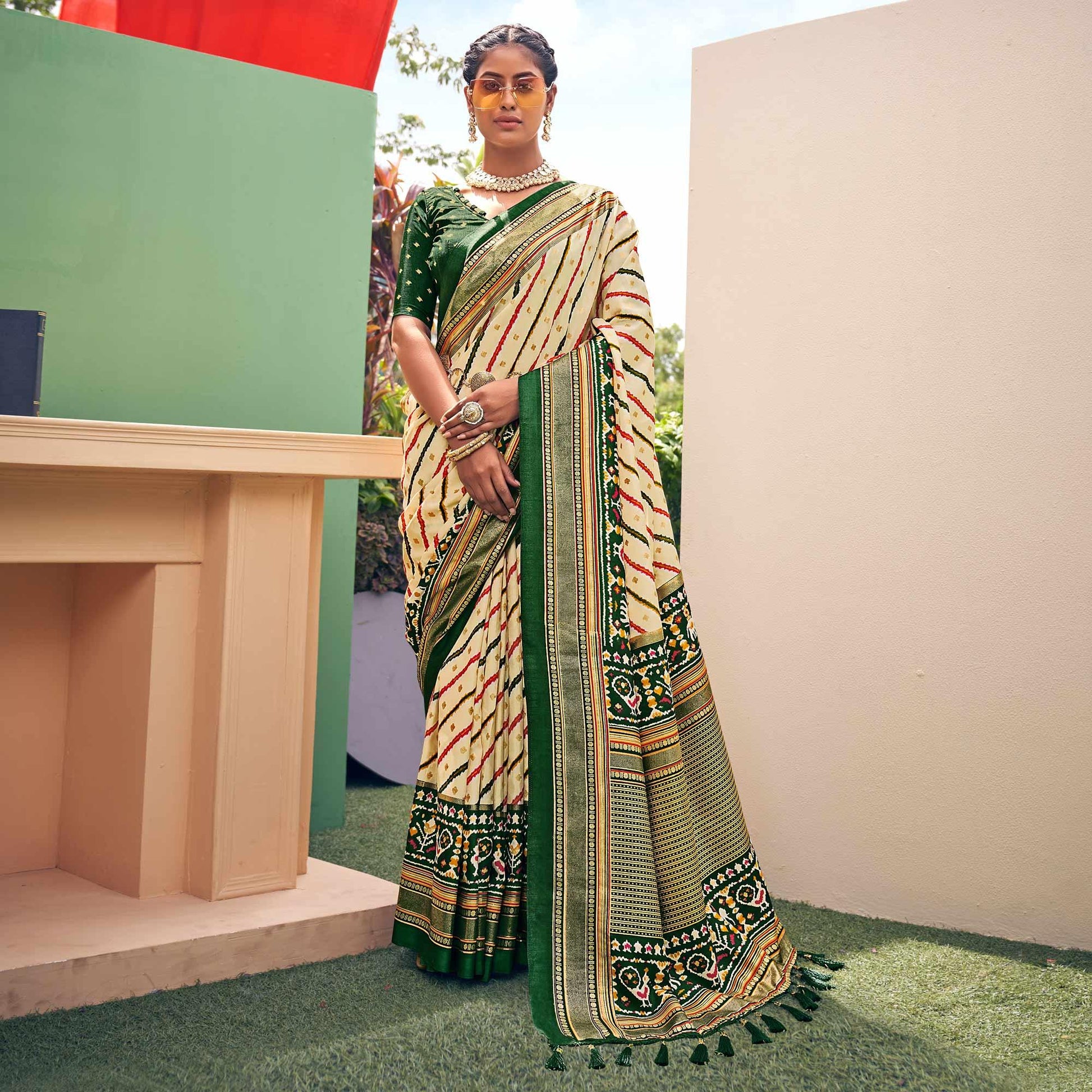 Cream Patola Printed Silk Saree With Tassels