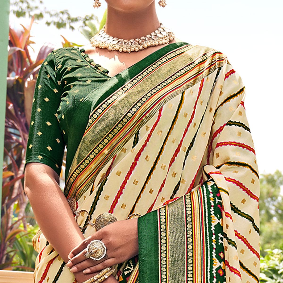 Cream Patola Printed Silk Saree With Tassels