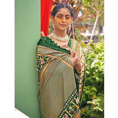 Cream Patola Printed Silk Saree With Tassels