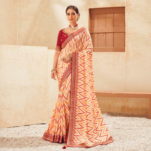 Cream Printed With Embellished Chiffon Saree With Tassels