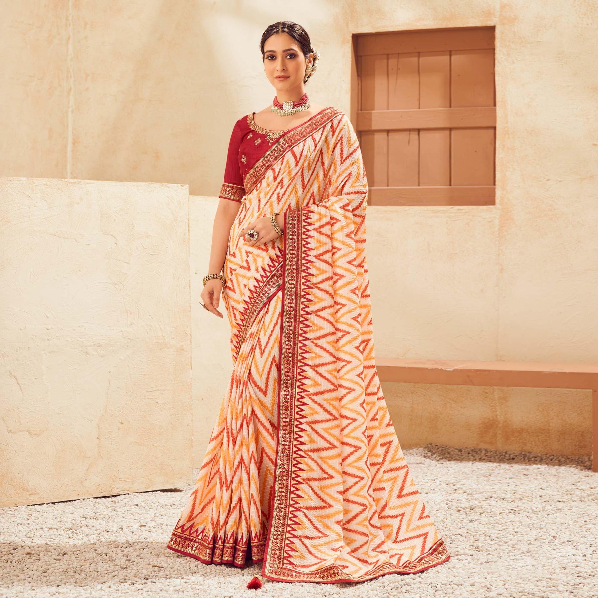 Cream Printed With Embellished Chiffon Saree With Tassels