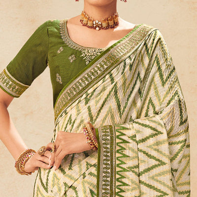 Cream Printed With Embellished Chiffon Saree With Tassels