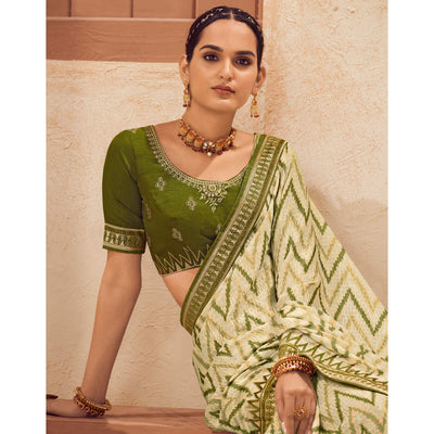 Cream Printed With Embellished Chiffon Saree With Tassels