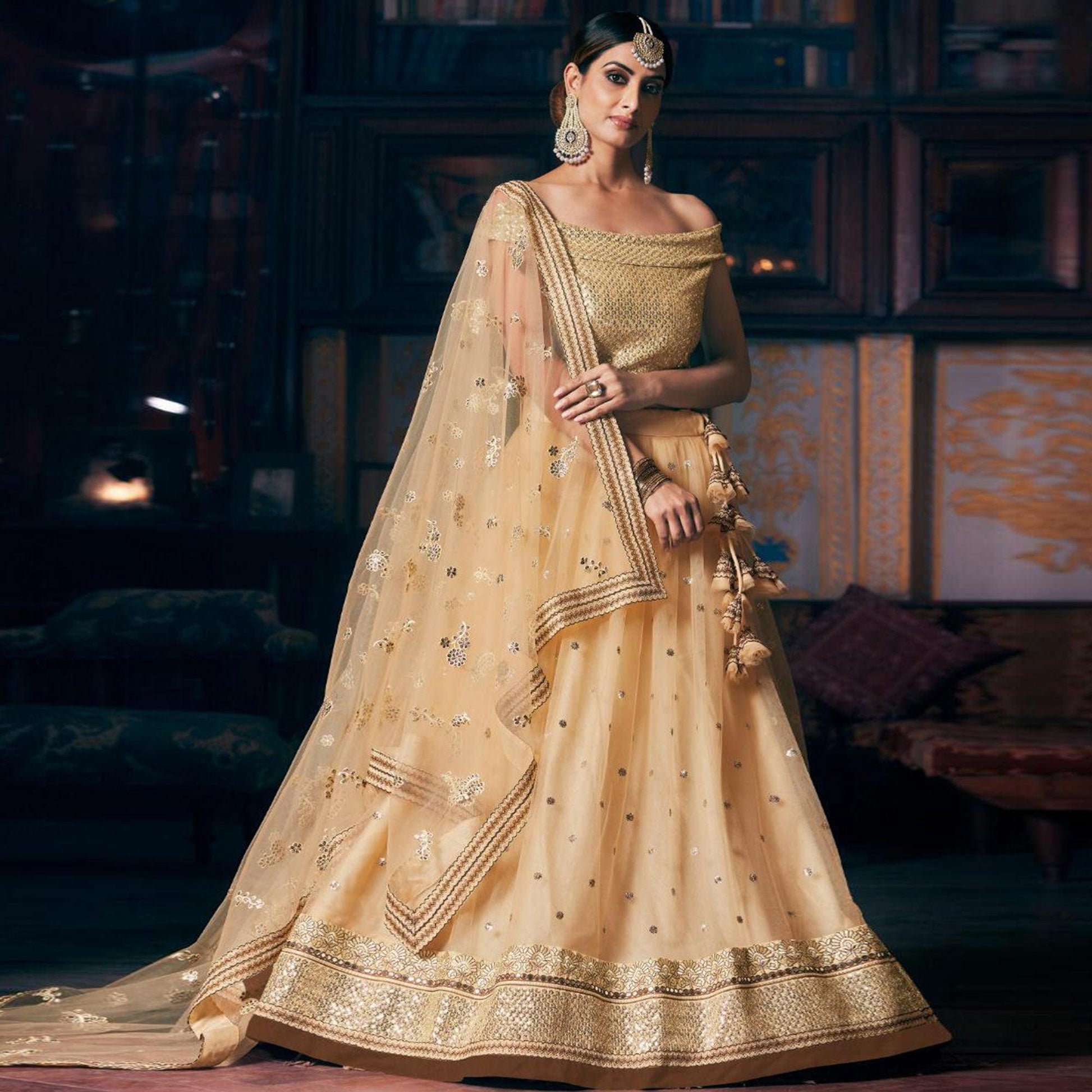 Cream Wedding Wear Floral Embroidery With Sequins And Dori Work Net Lehenga Choli