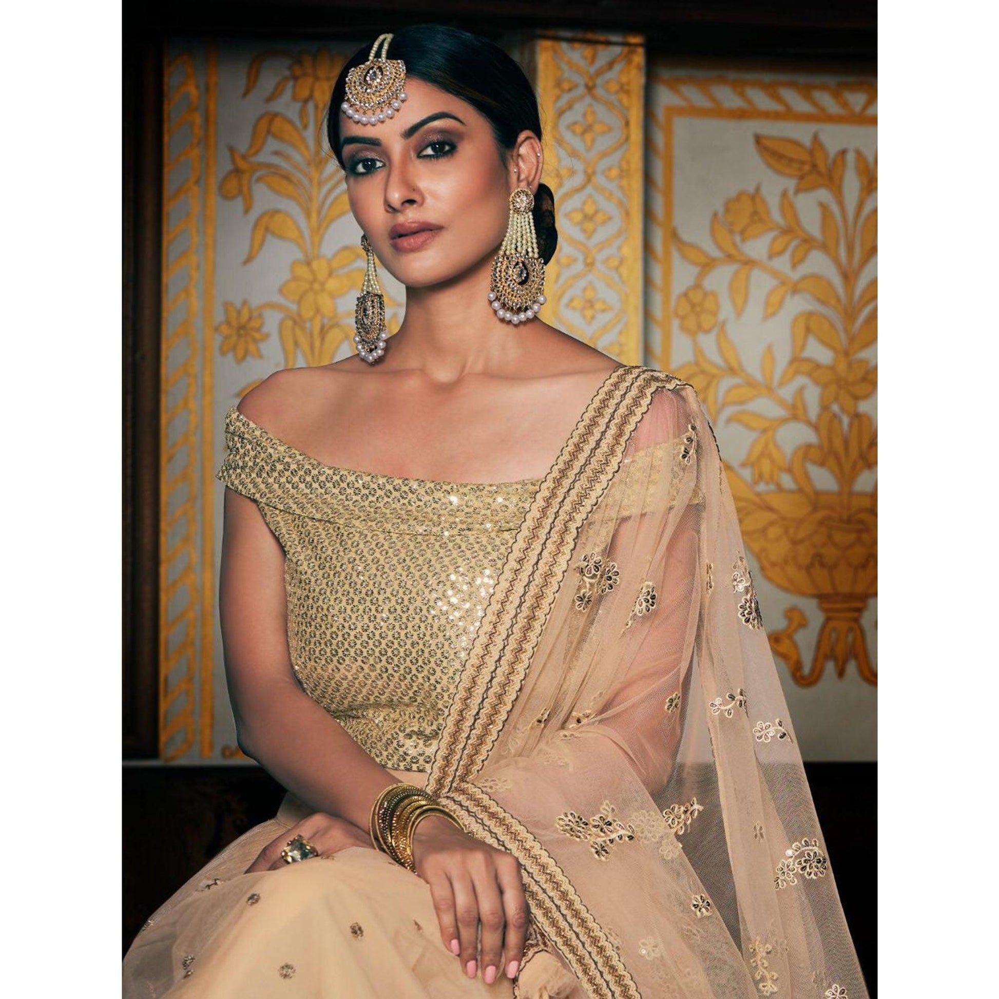 Cream Wedding Wear Floral Embroidery With Sequins And Dori Work Net Lehenga Choli