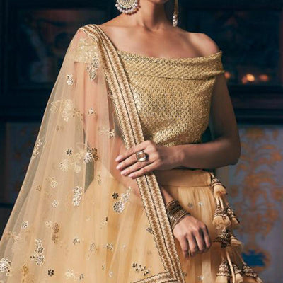 Cream Wedding Wear Floral Embroidery With Sequins And Dori Work Net Lehenga Choli