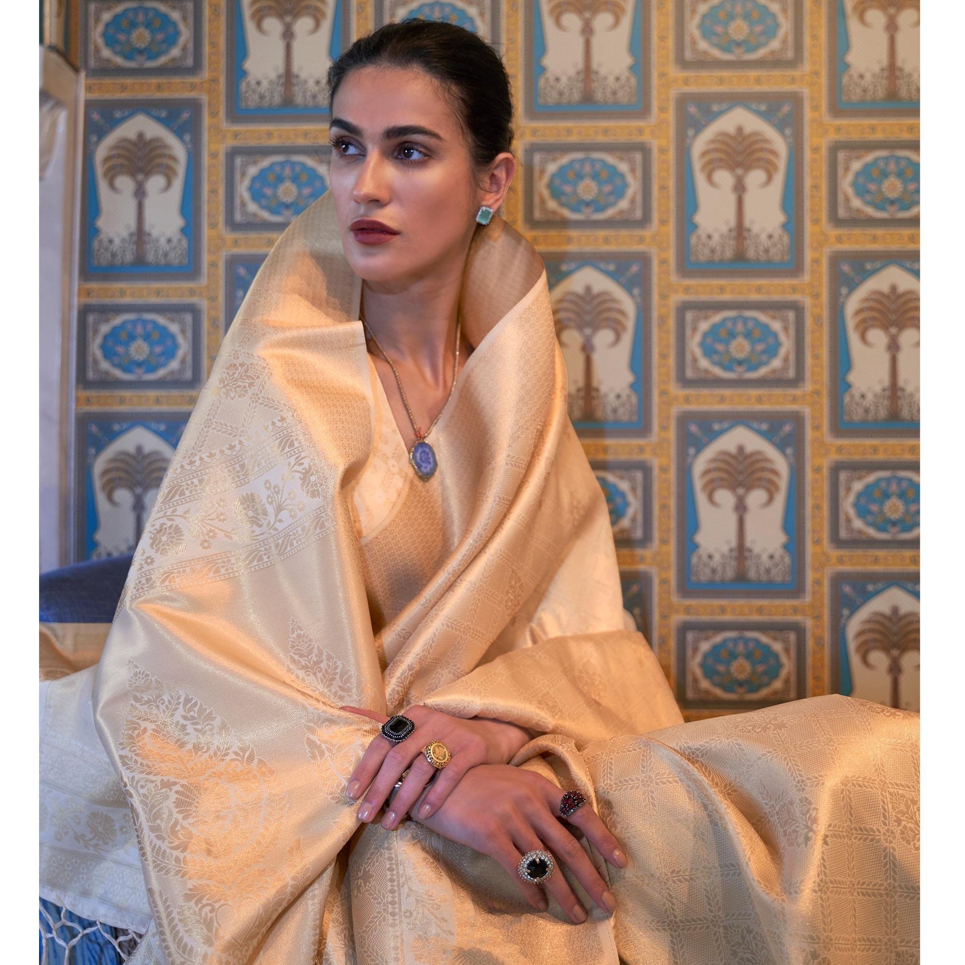 Cream Woven Art Silk Saree With Tassels