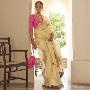 Cream Woven Organza Saree With Tassels