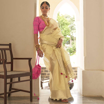 Cream Woven Organza Saree With Tassels