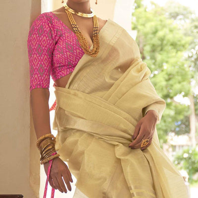 Cream Woven Organza Saree With Tassels