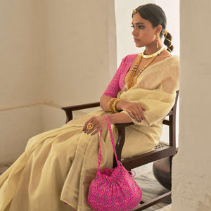 Cream Woven Organza Saree With Tassels