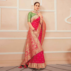 Dark Pink Festive Wear Woven Banarasi Silk Saree With Tassels