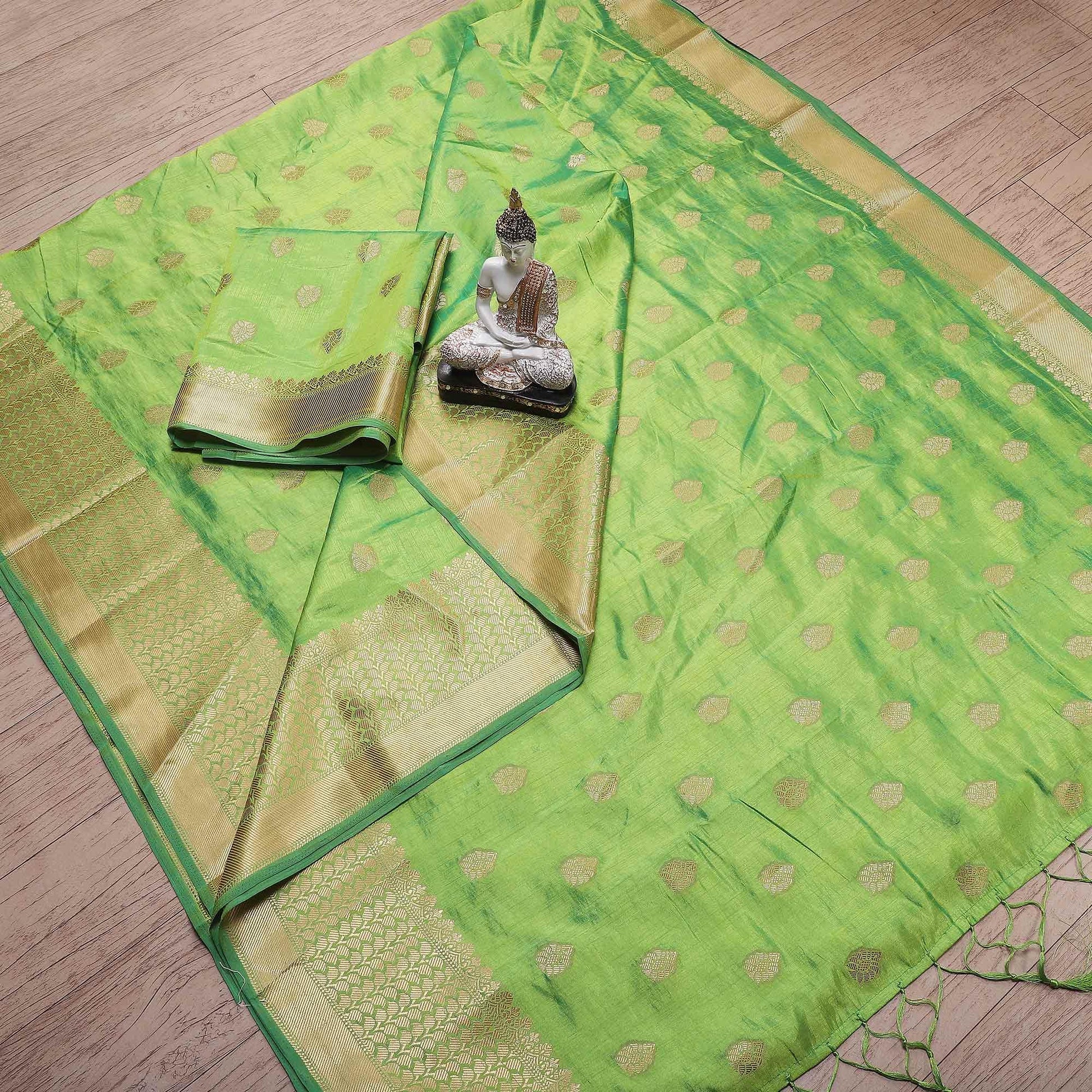 Dazzling Green Colored Festive Wear Woven Banarasi Silk Saree With Tassels