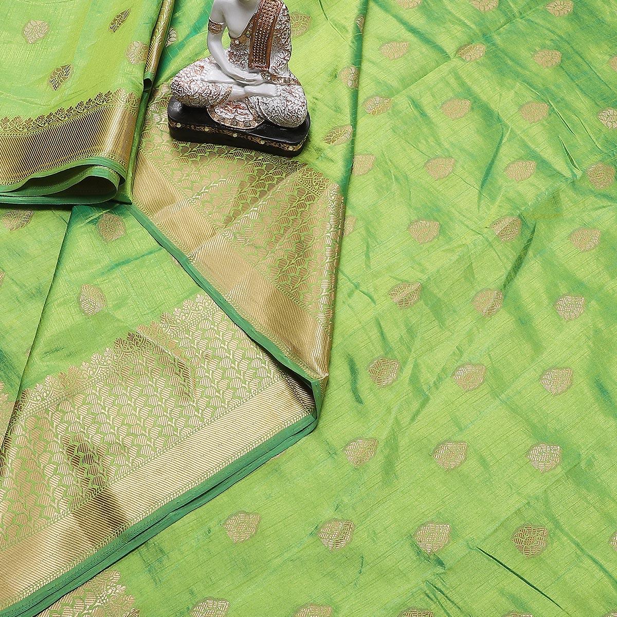 Dazzling Green Colored Festive Wear Woven Banarasi Silk Saree With Tassels