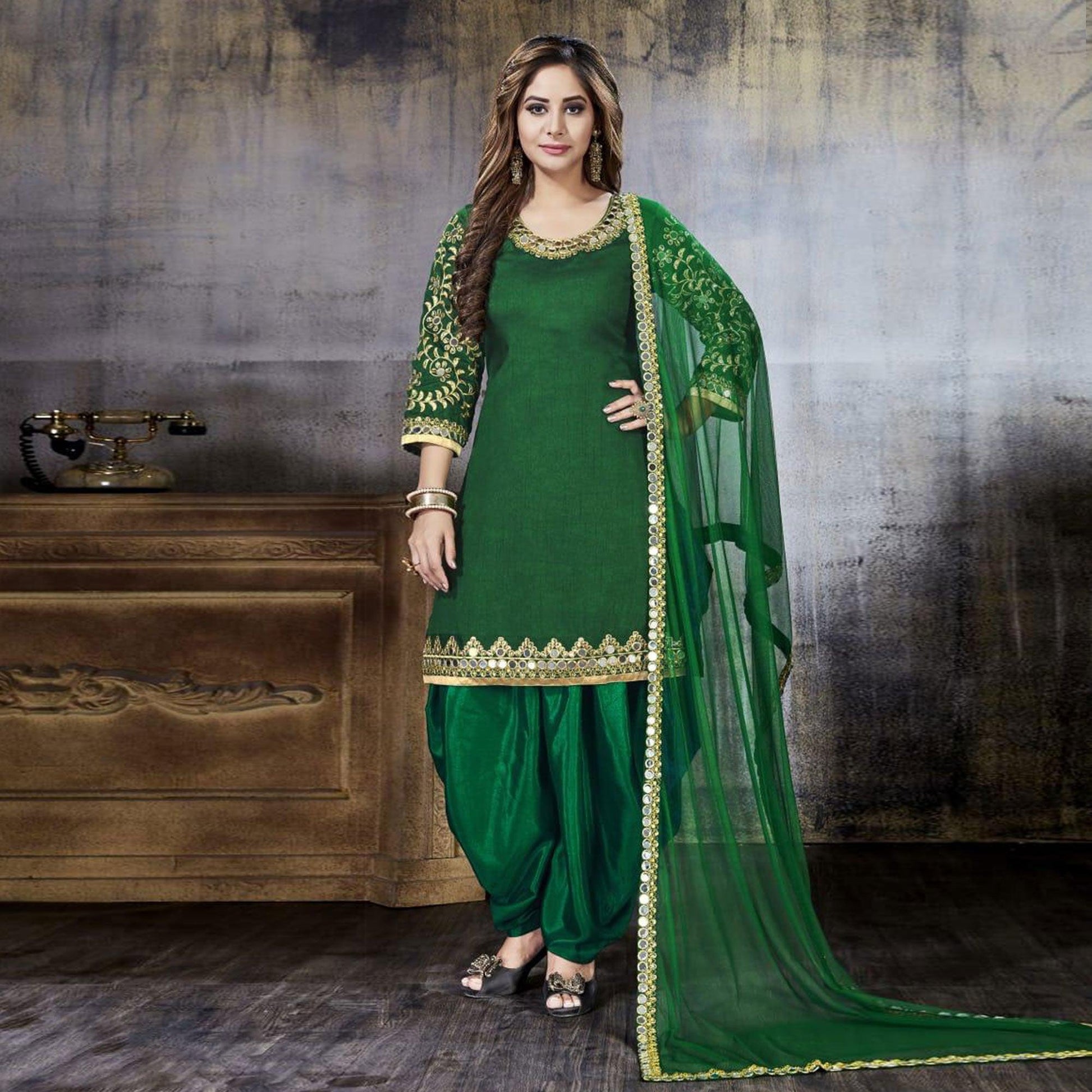 Dazzling Green Colored Party Wear Embroidered Art Silk Suit