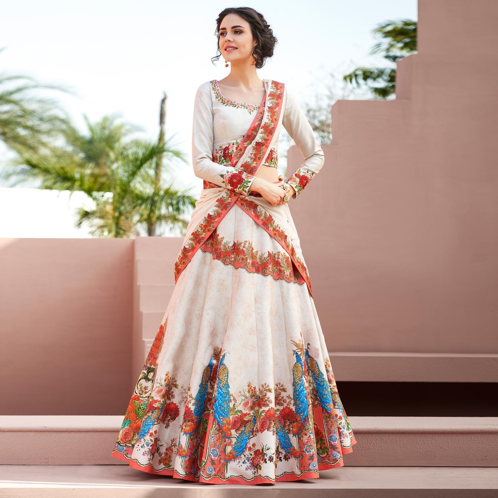 Dazzling Off-White Colored Designer Partywear Embroidered Silk Lehenga Choli