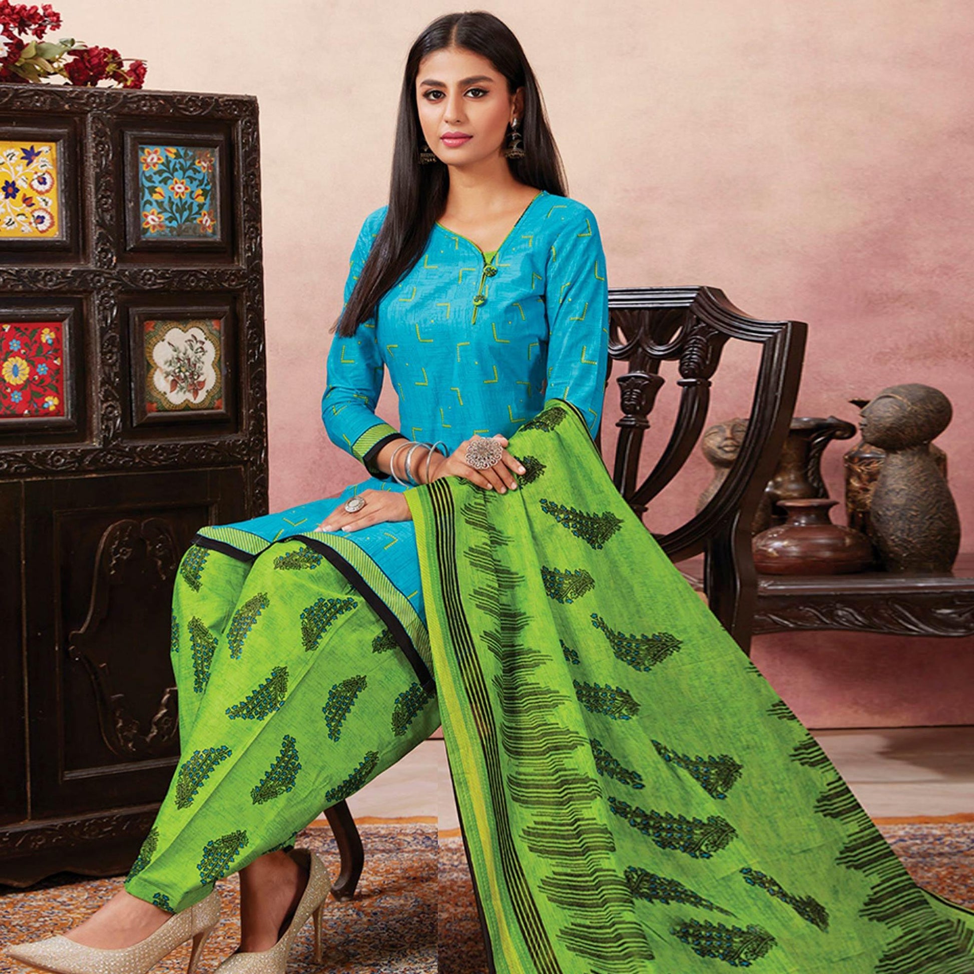 Dazzling Sky Blue Colored Casual Wear Printed Pure Cotton Patiala Dress Material