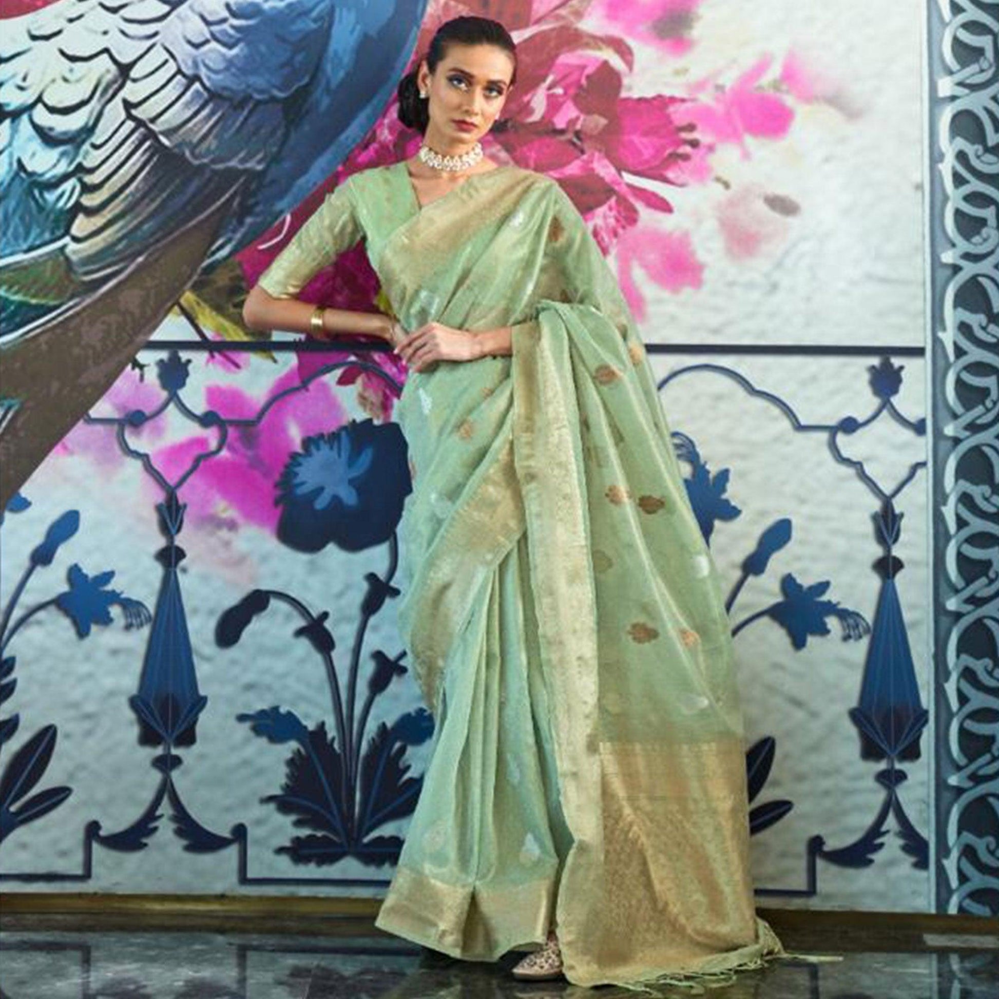 Dazzling Turquoise Coloured Partywear Organza weaving Saree