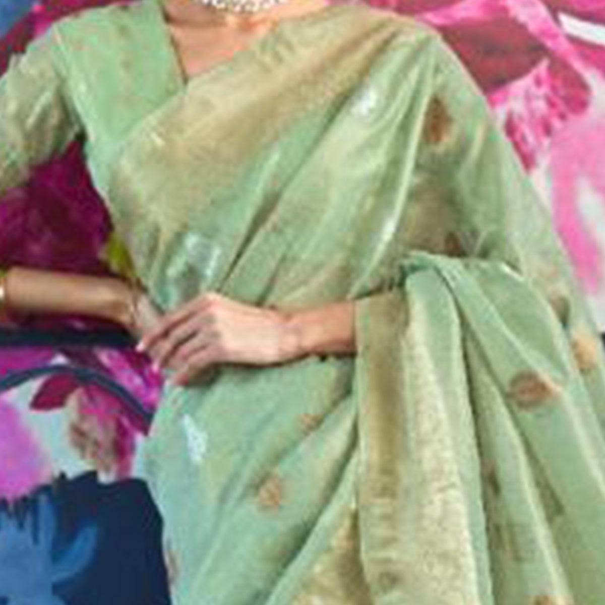 Dazzling Turquoise Coloured Partywear Organza weaving Saree