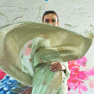 Dazzling Turquoise Coloured Partywear Organza weaving Saree