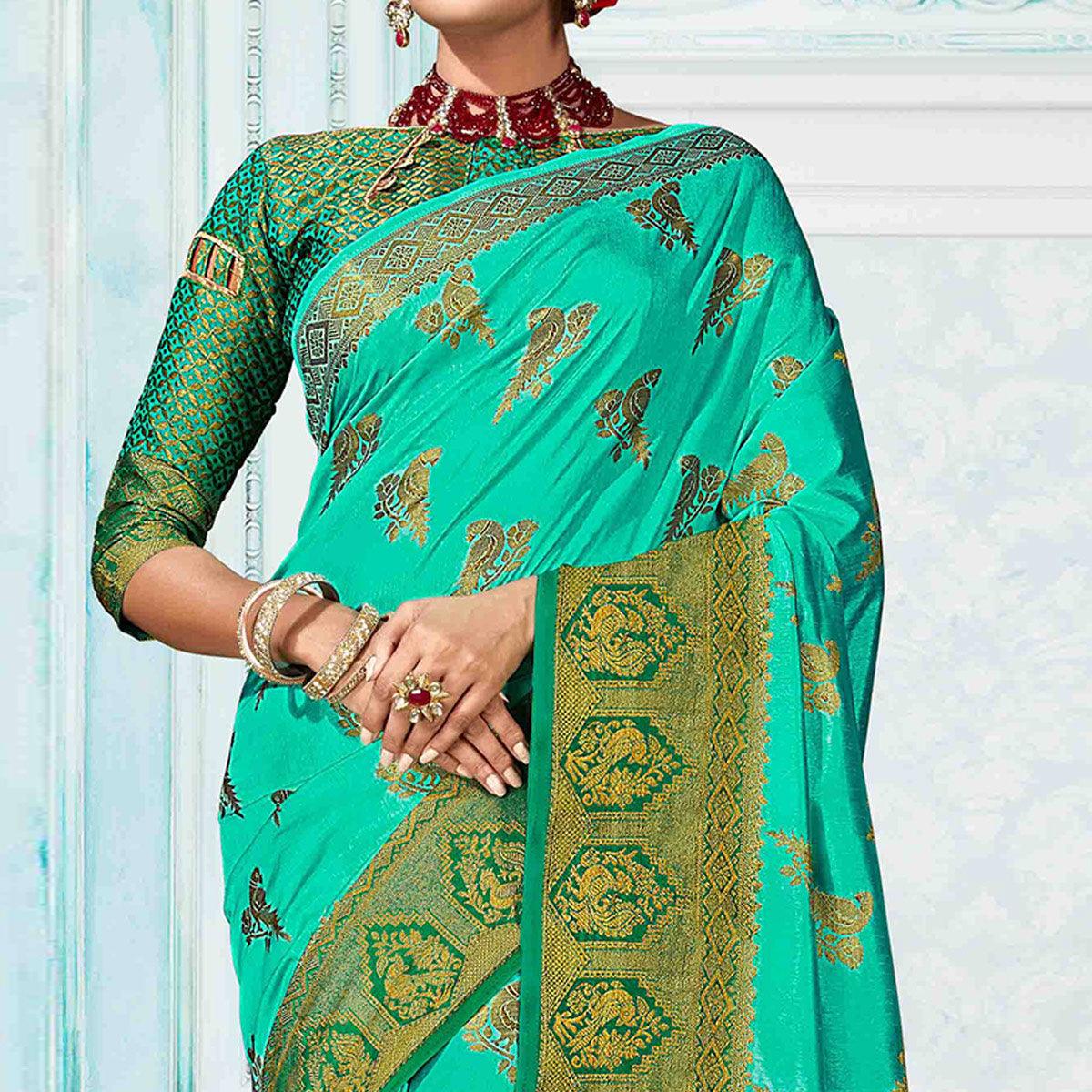 Dazzling Turquoise Green Colored Festive Wear Woven Nylon Silk Saree