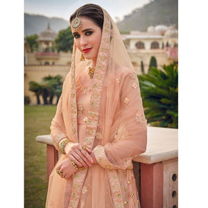 Deep Peach Embellished & Embroidered Net Lehenga Choli