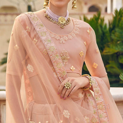 Deep Peach Embellished & Embroidered Net Lehenga Choli