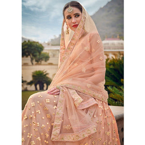 Deep Peach Embellished & Embroidered Net Lehenga Choli