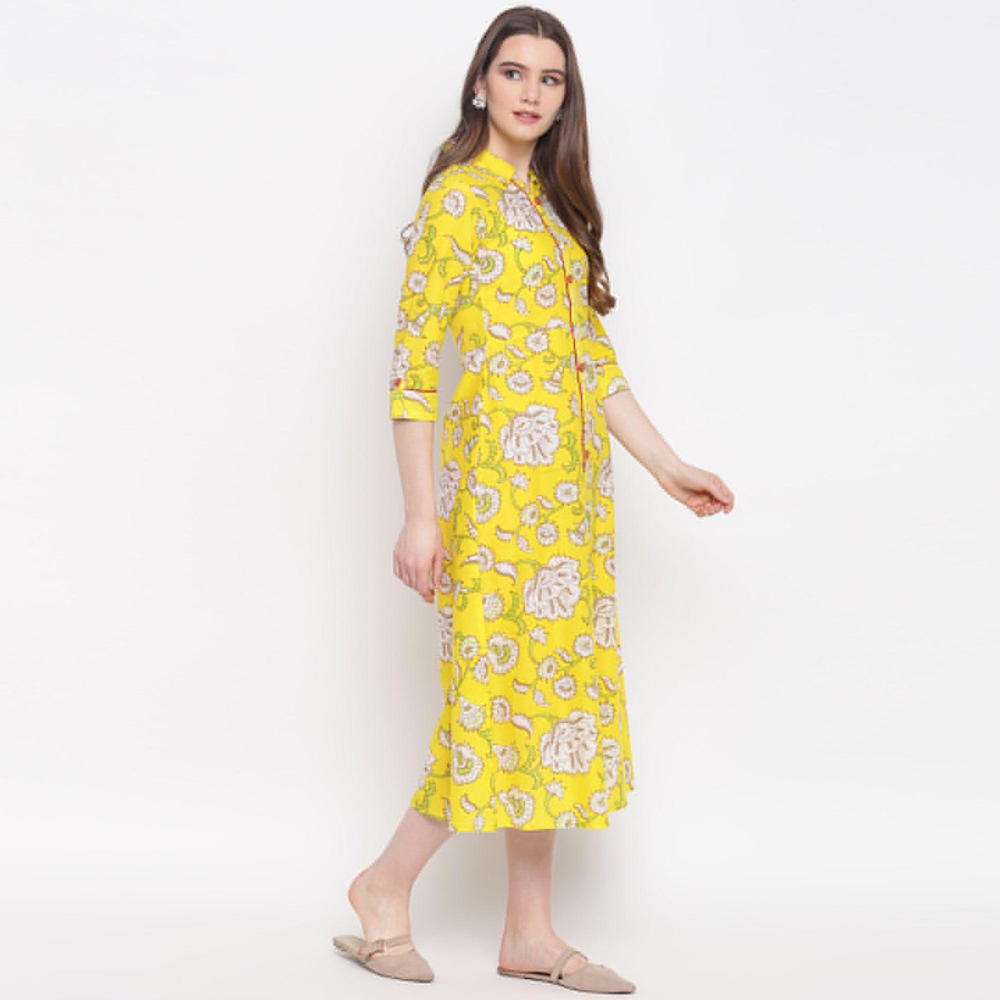 Delightful Lemon Yellow Colored Casual Wear Printed A-Line Calf Length Cambric Kurti