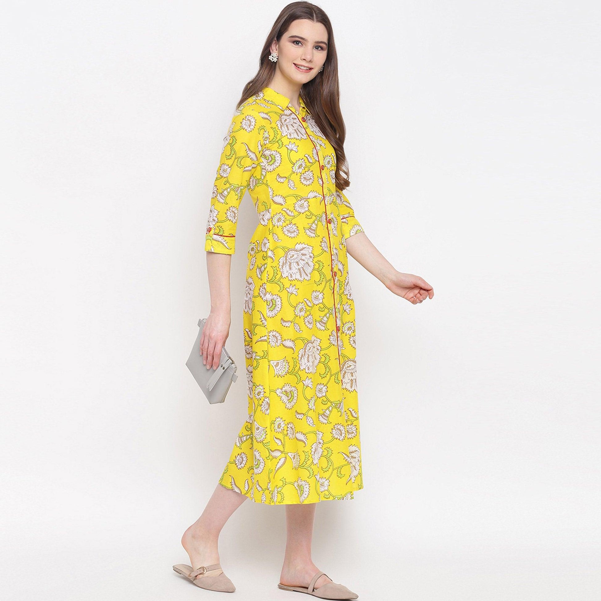Delightful Lemon Yellow Colored Casual Wear Printed A-Line Calf Length Cambric Kurti