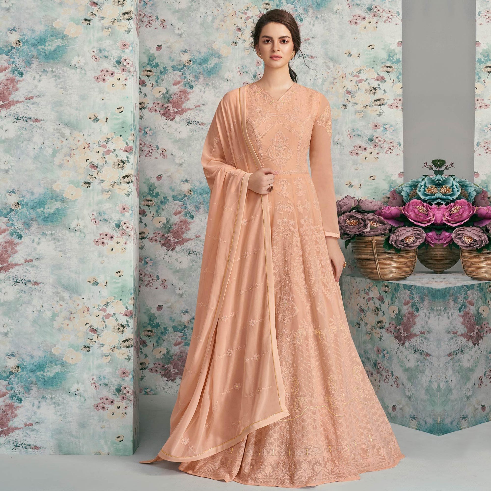 Delightful Peach Colored Party Wear Embroidered Heavy Faux Georgette Anarkali Suit