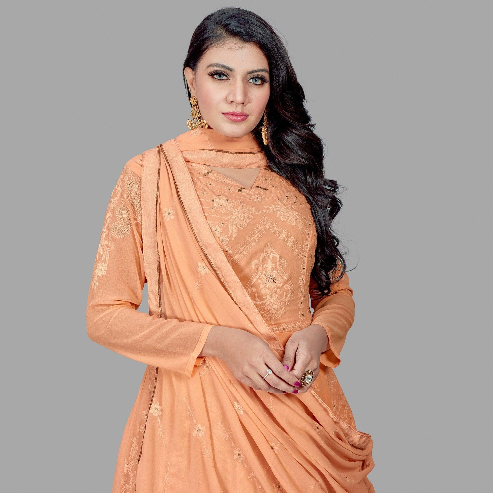 Delightful Peach Colored Party Wear Embroidered Heavy Faux Georgette Anarkali Suit