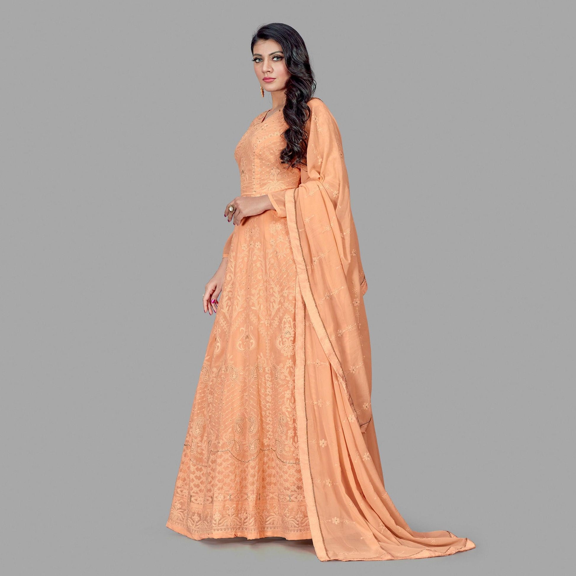 Delightful Peach Colored Party Wear Embroidered Heavy Faux Georgette Anarkali Suit