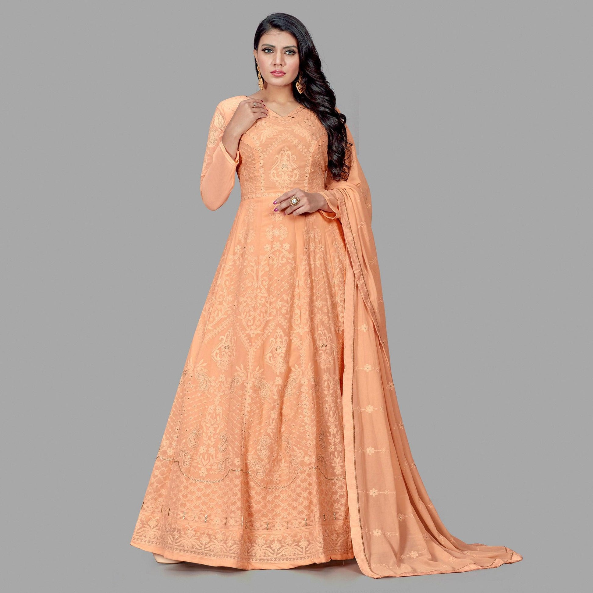 Delightful Peach Colored Party Wear Embroidered Heavy Faux Georgette Anarkali Suit
