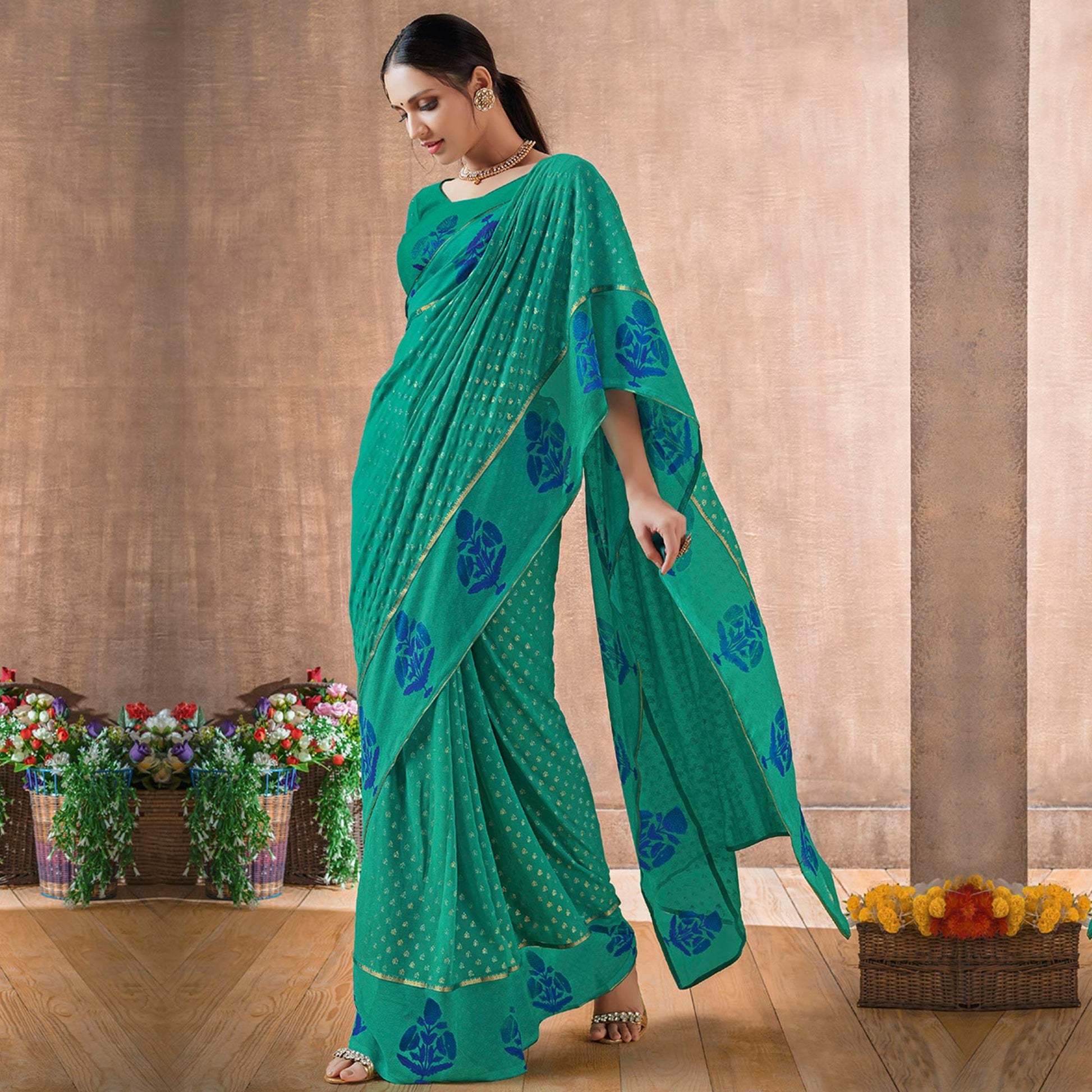 Delightful Rama Green Colored Festive Wear Foil Printed Georgette Saree