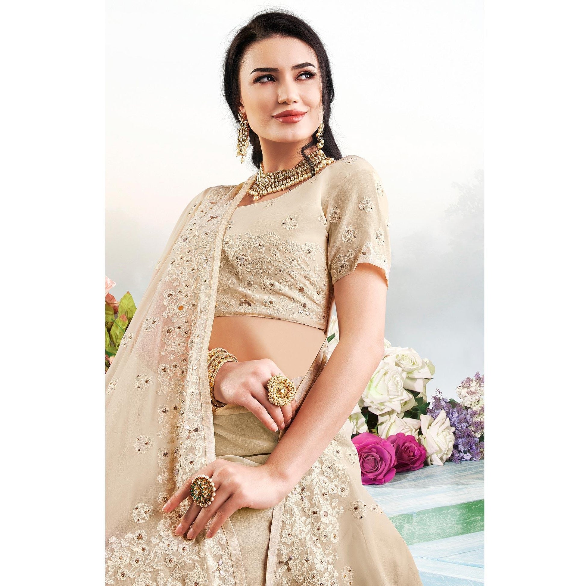 Demanding Beige Colored Partywear Embroidered Georgette Saree