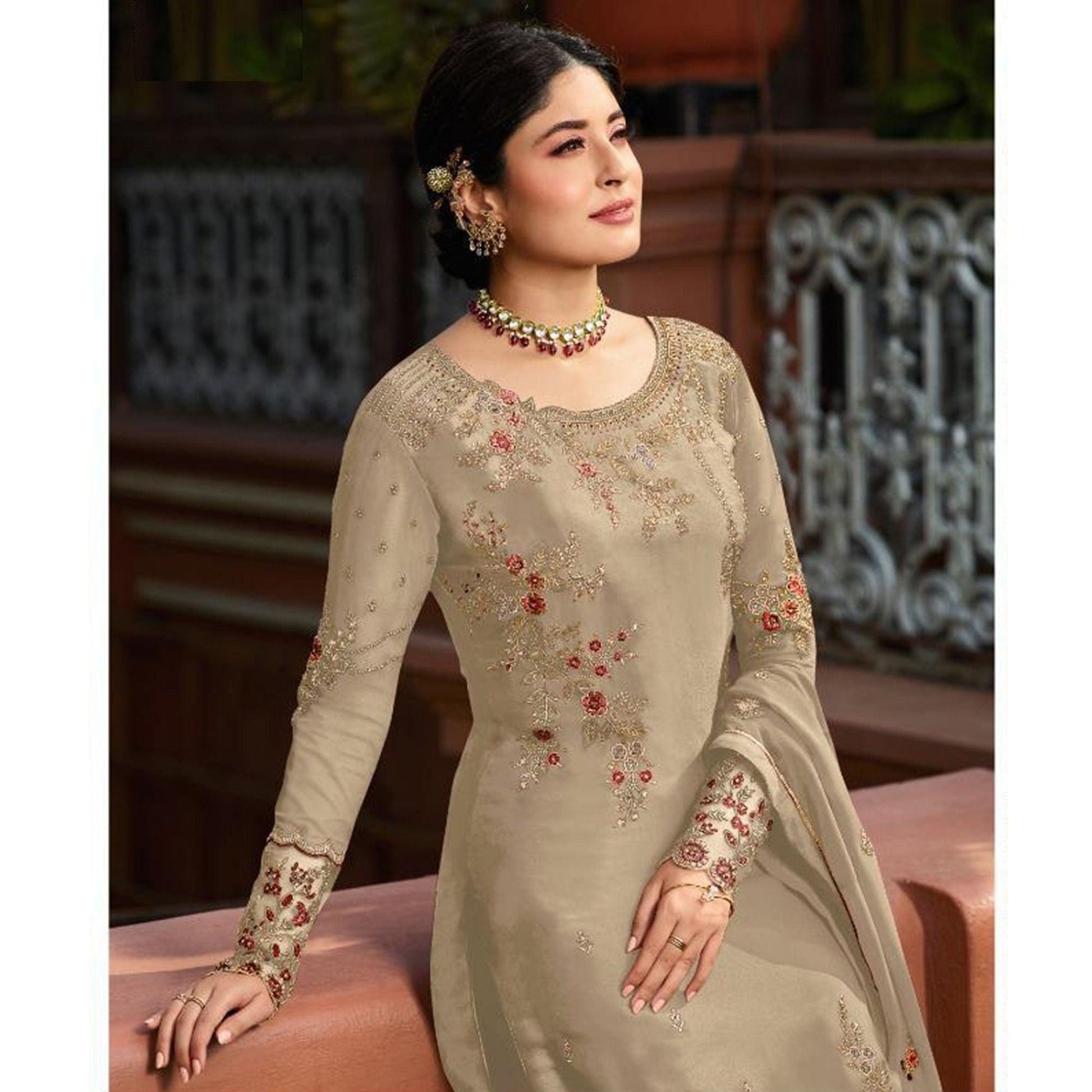 Demanding Beige Colored Partywear Embroidered Gerorgette Straight Suit