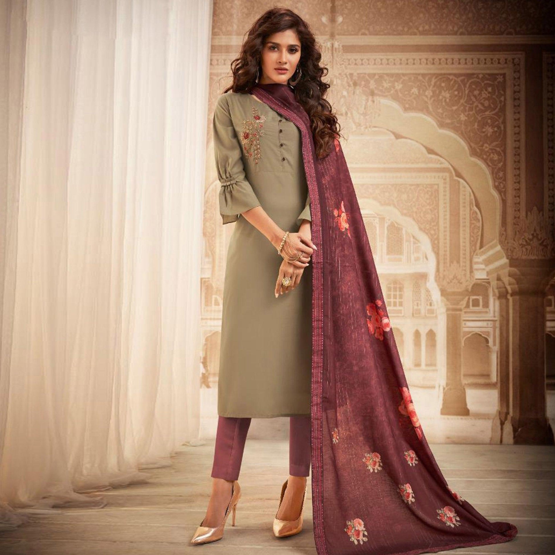 Demanding Beige Colored Partywear Embroidered Heavy Muslin Salwar Suit
