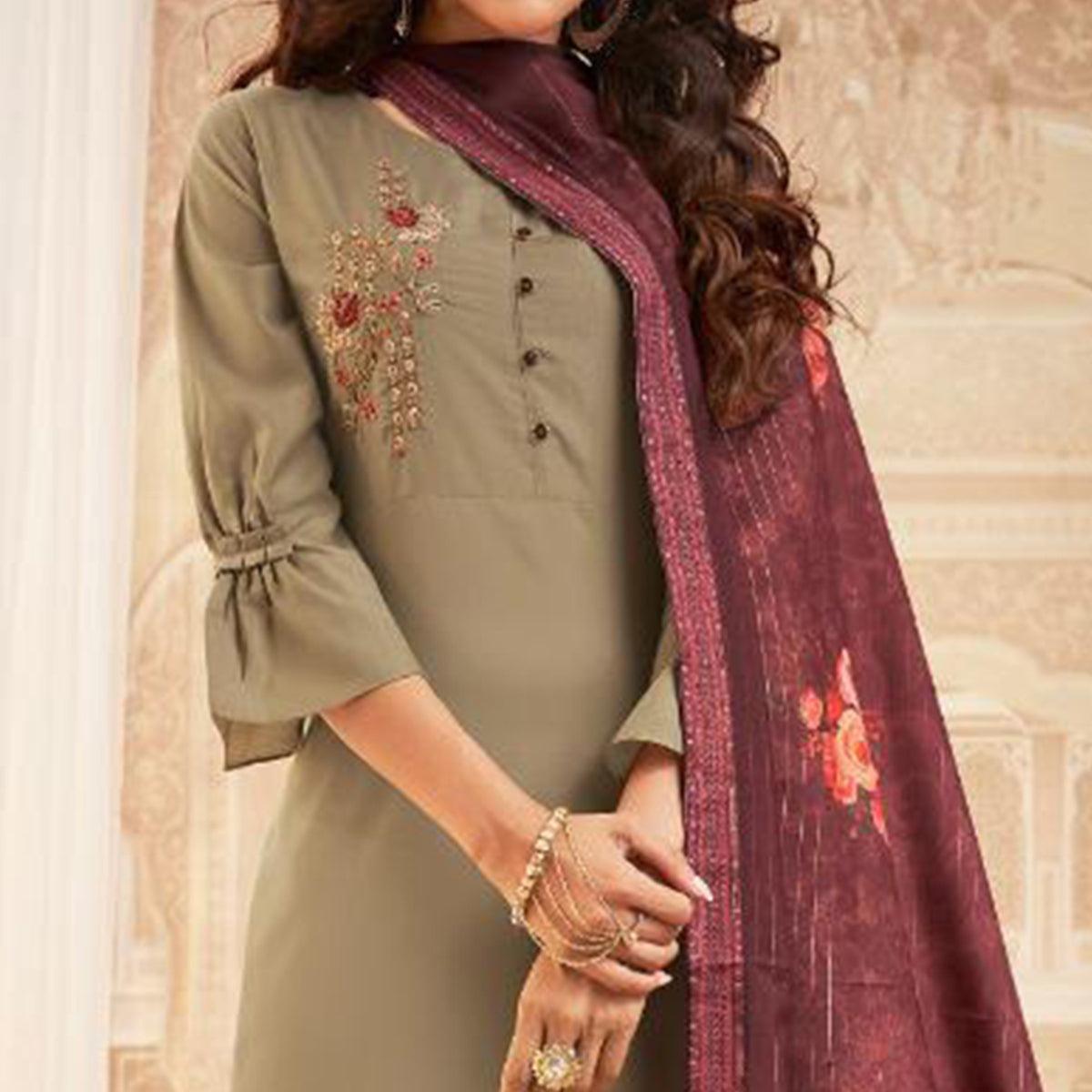 Demanding Beige Colored Partywear Embroidered Heavy Muslin Salwar Suit