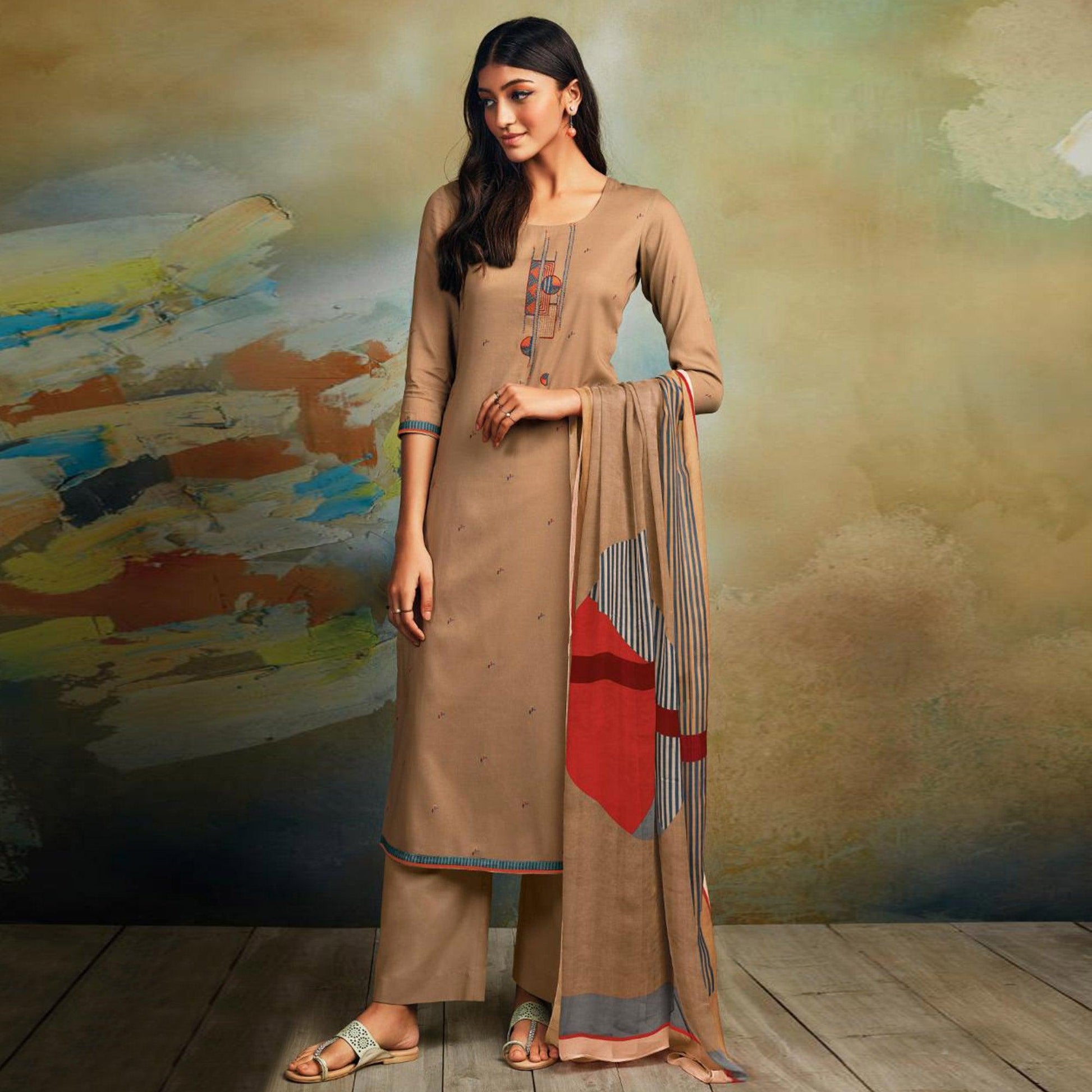 Demanding Beige Colored Partywear Printed and Embroidered Cotton Satin Palazzo Suit