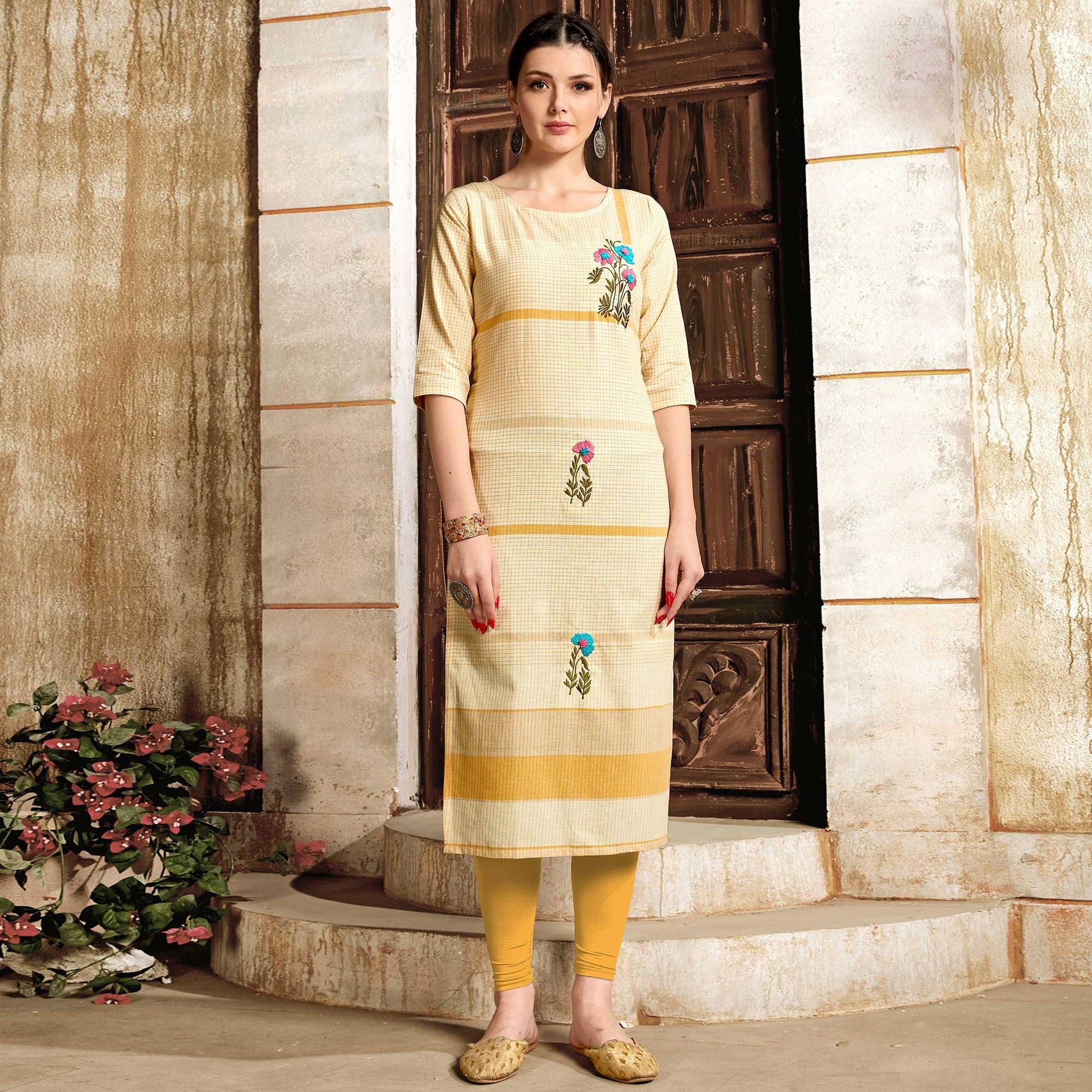 Demanding Cream - Mustard Colored Casual Wear Embroidered Pure Cotton Kurti