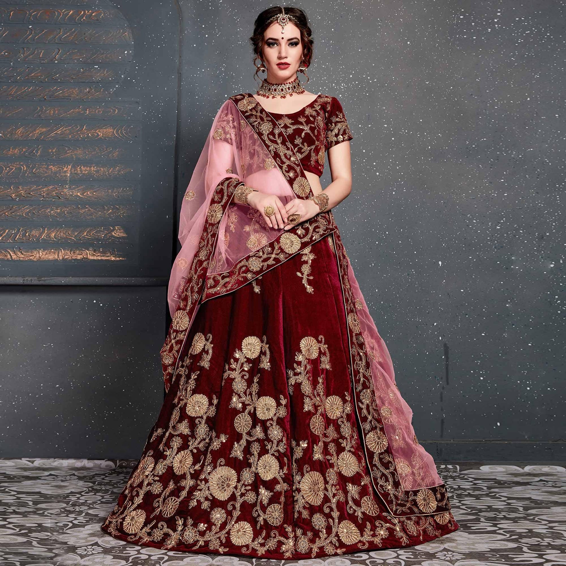 Demanding Maroon Colored Partywear Designer Embroidered Velvet Lehenga Choli
